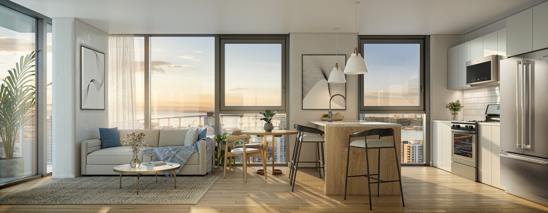 Living area and kitchen with large windows