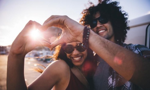 a man and woman posing for a picture