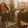 Cute couple eating and walking